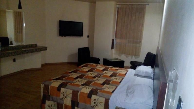 Suite con cama extragrande